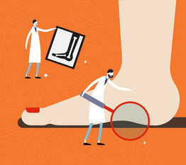 Doctor examining flat feet to understand the causes of the foot condition